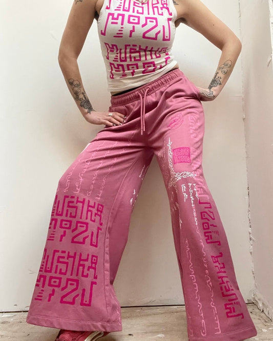 PINK MADNESS Alien Contact Hand printed wide leg tracksuit bottoms/ joggers. (Gender Neutral. Pink)