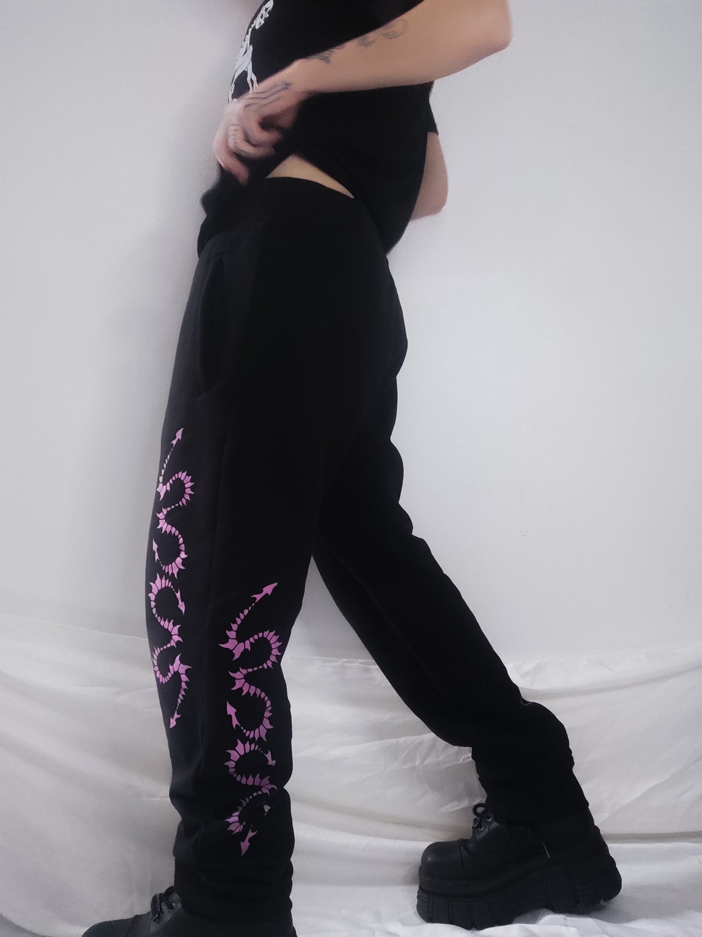 Hand printed Creature organic cotton tracksuit bottoms. Pink