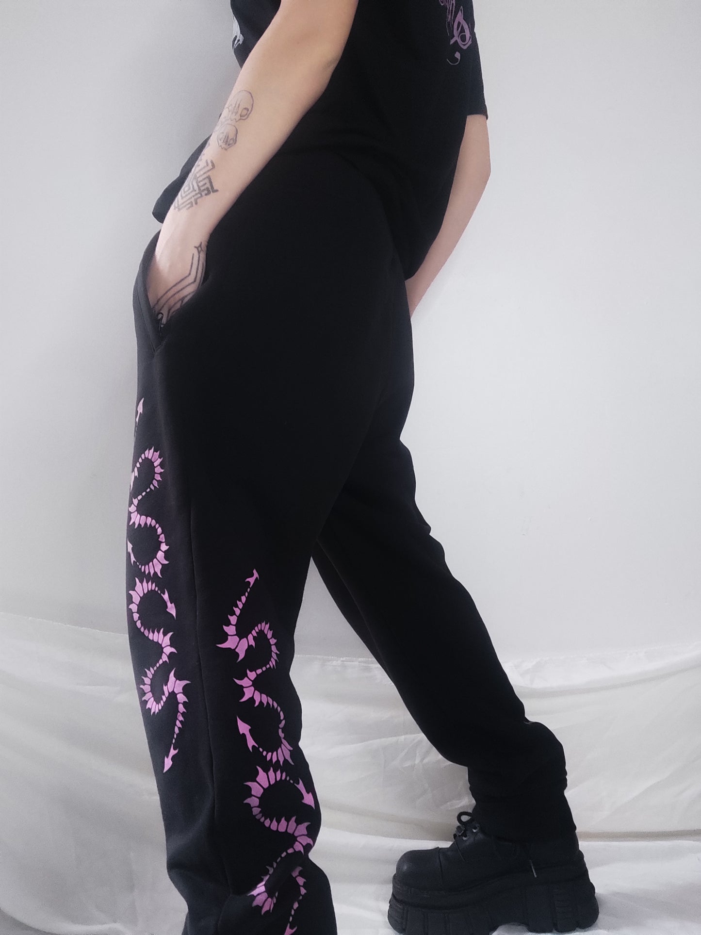 Hand printed Creature organic cotton tracksuit bottoms. Pink