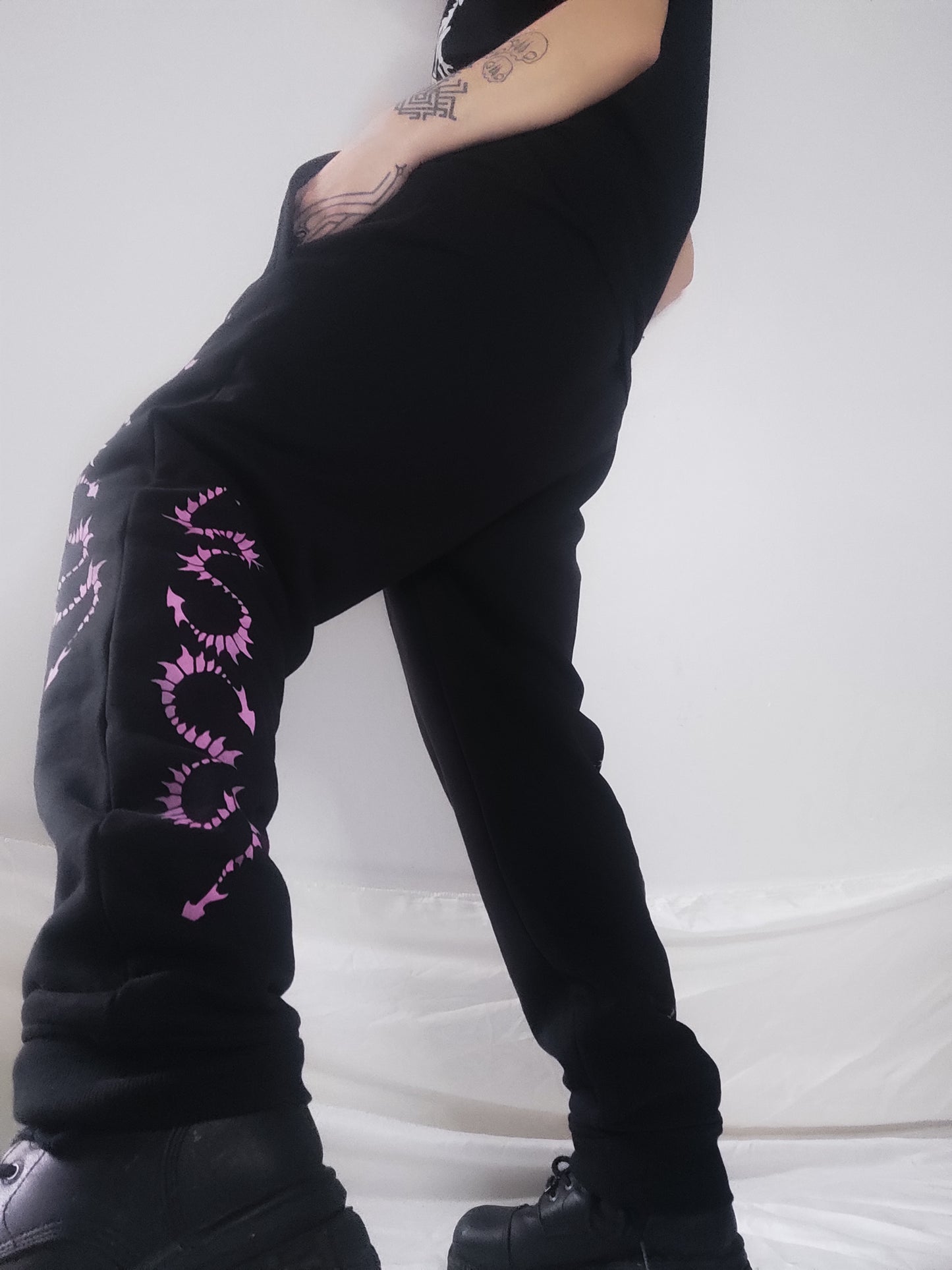 Hand printed Creature organic cotton tracksuit bottoms. Pink