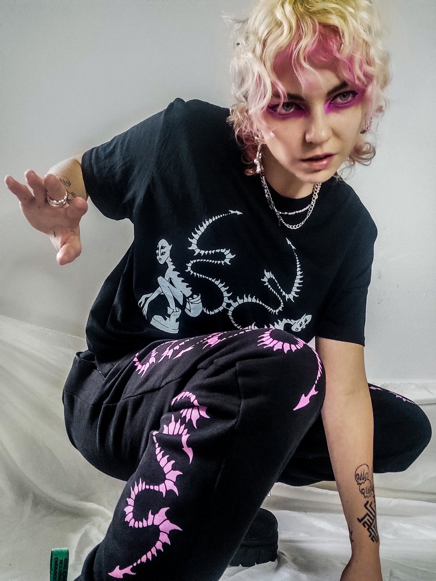 Hand printed Creature organic cotton tracksuit bottoms. Pink