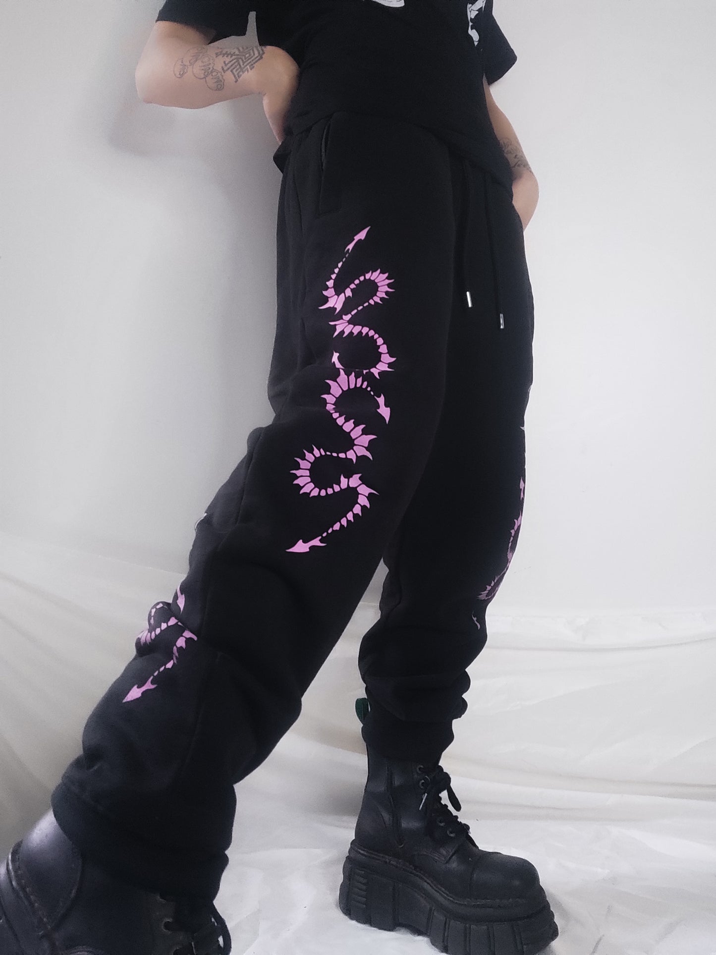 Hand printed Creature organic cotton tracksuit bottoms. Pink