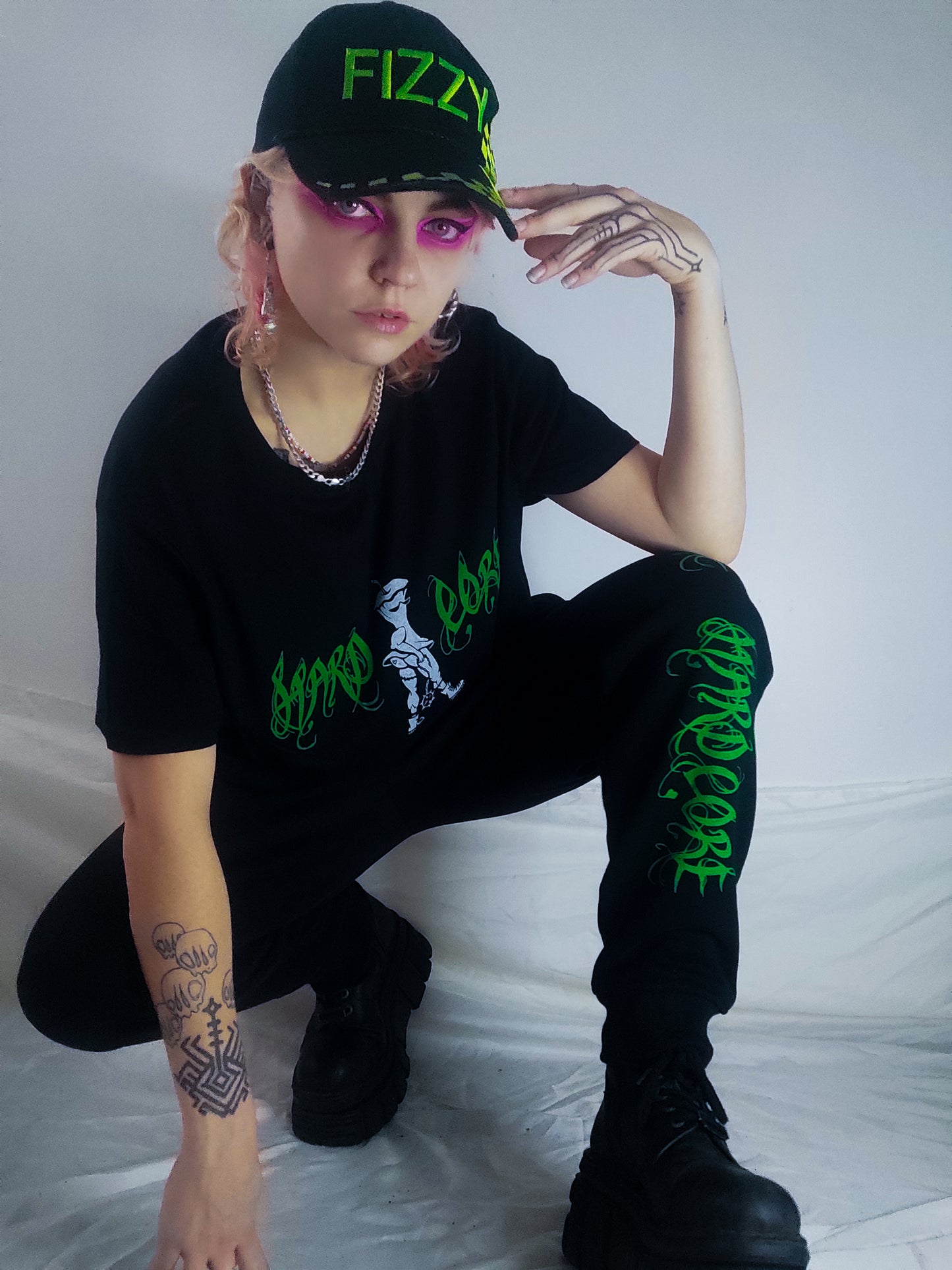 Hardcore Hand printed organic cotton tracksuit bottoms. Green