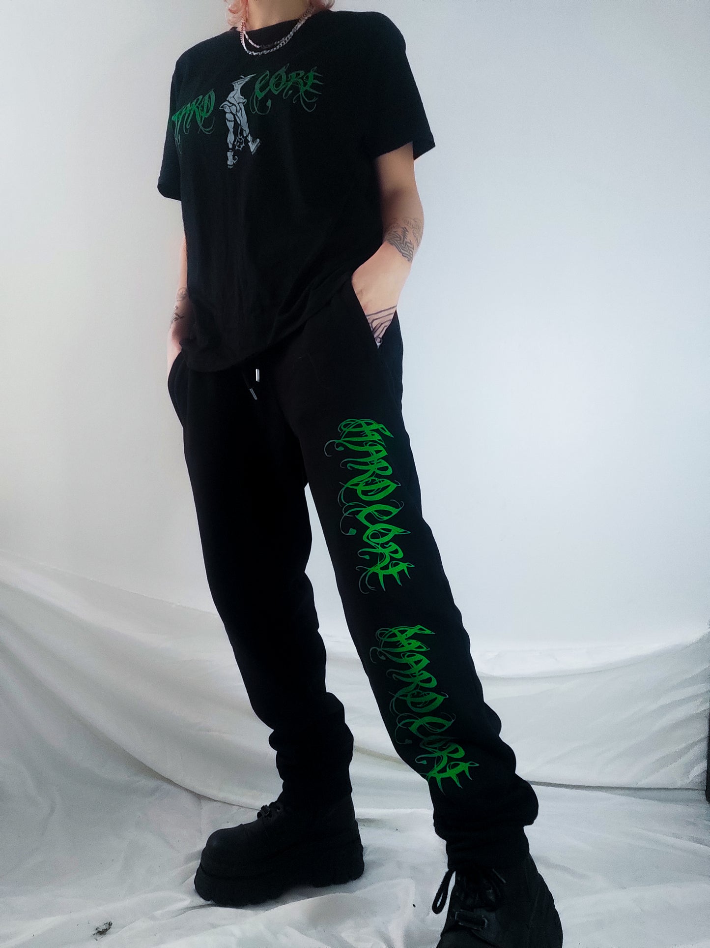 Hardcore Hand printed organic cotton tracksuit bottoms. Green