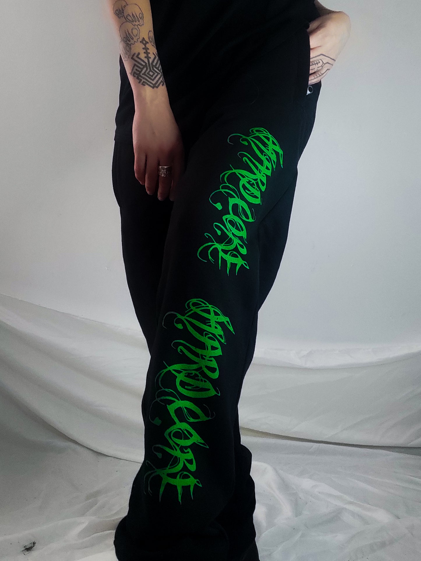 Hardcore Hand printed organic cotton tracksuit bottoms. Green