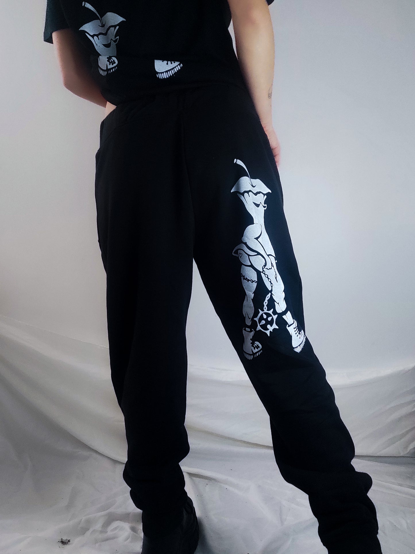 Hardcore Hand printed organic cotton tracksuit bottoms. Green