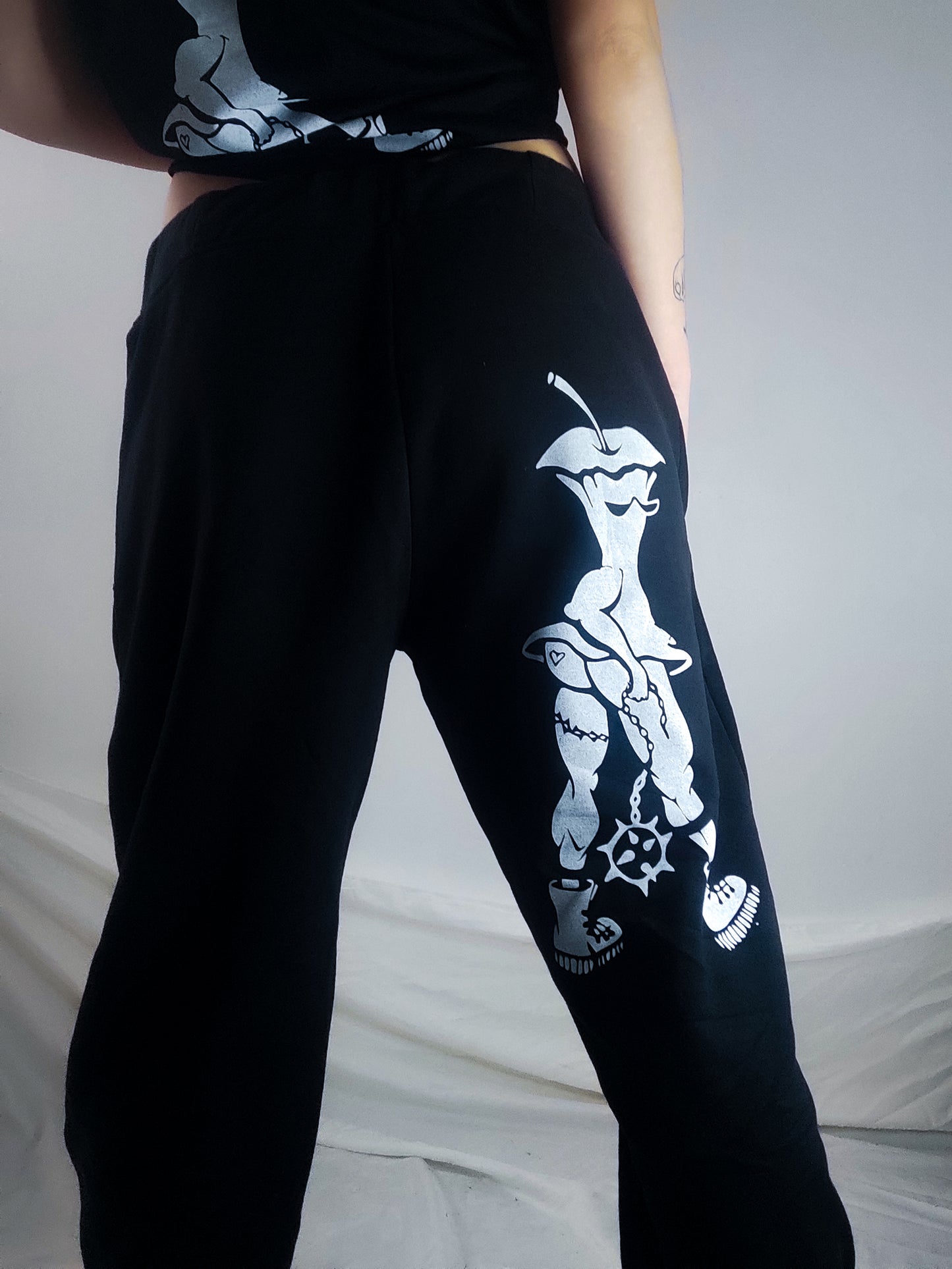 Hardcore Hand printed organic cotton tracksuit bottoms. Green