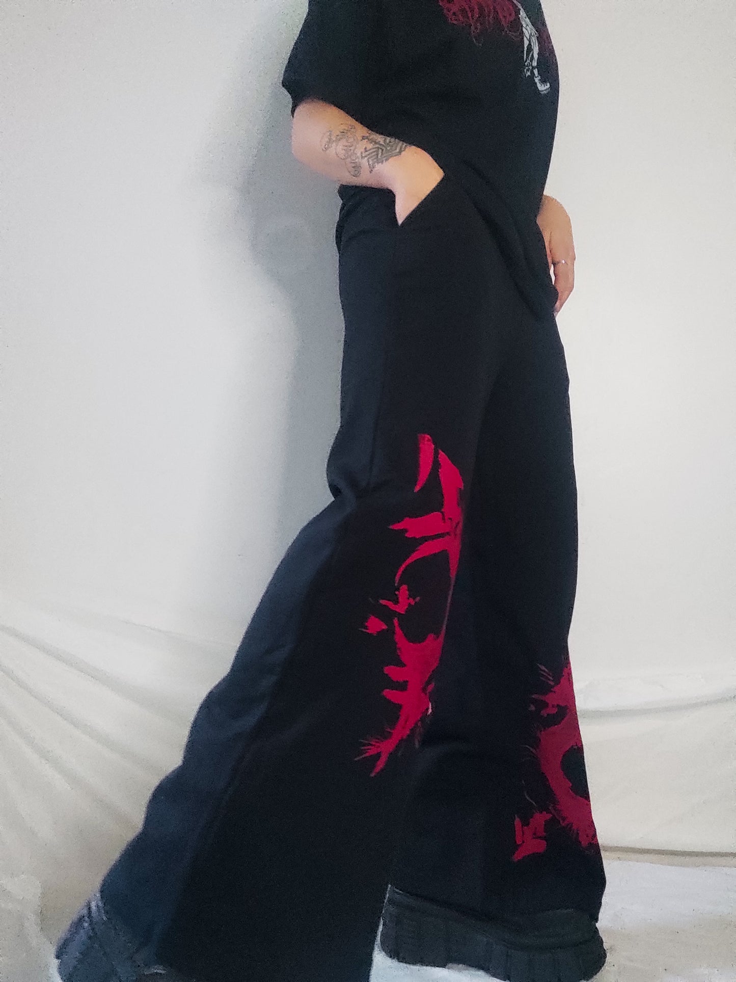 Gender F*ck hand printed wide leg tracksuit bottoms/Joggers. Red