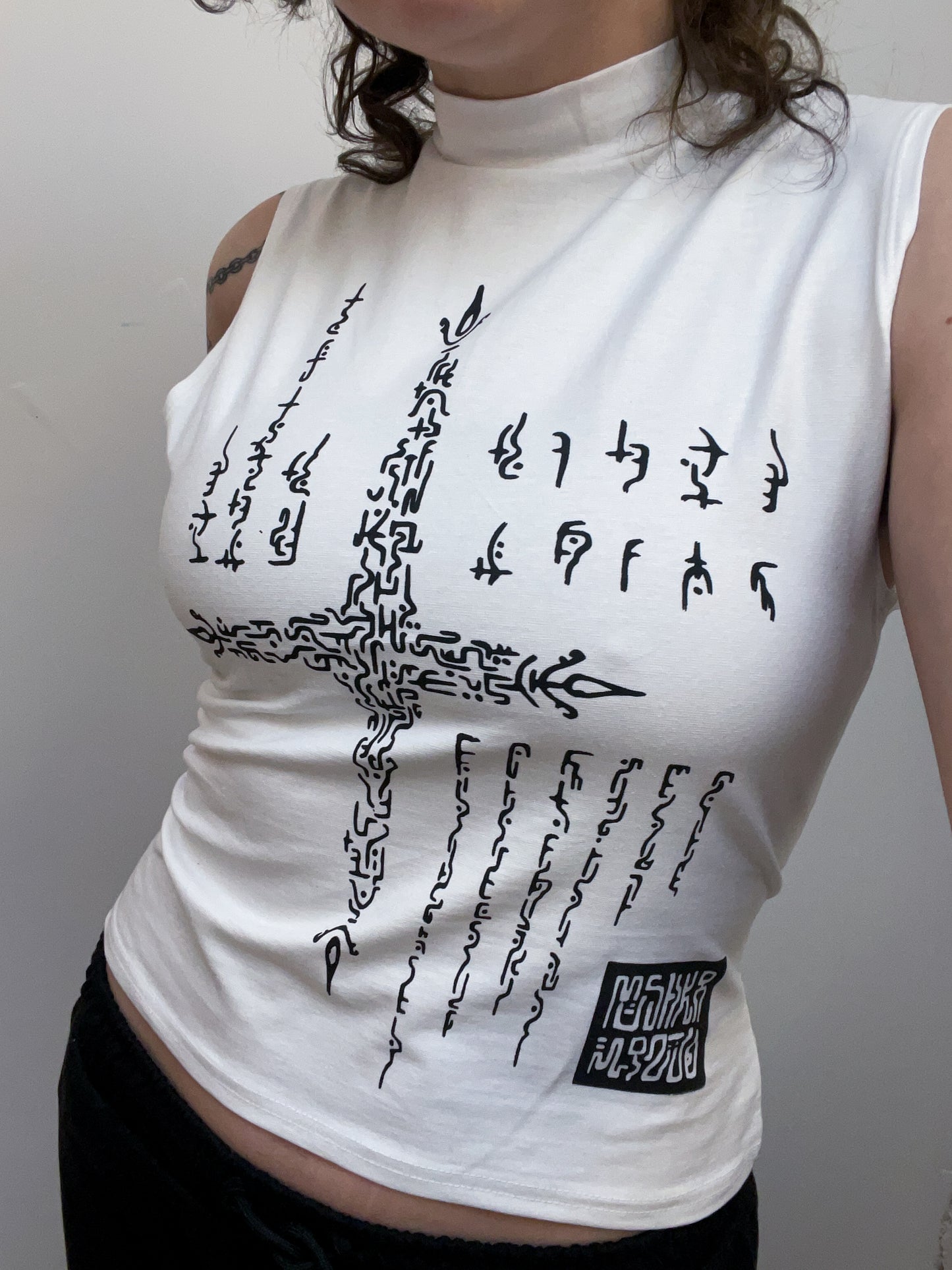 Alien code hand printed tank tops. White