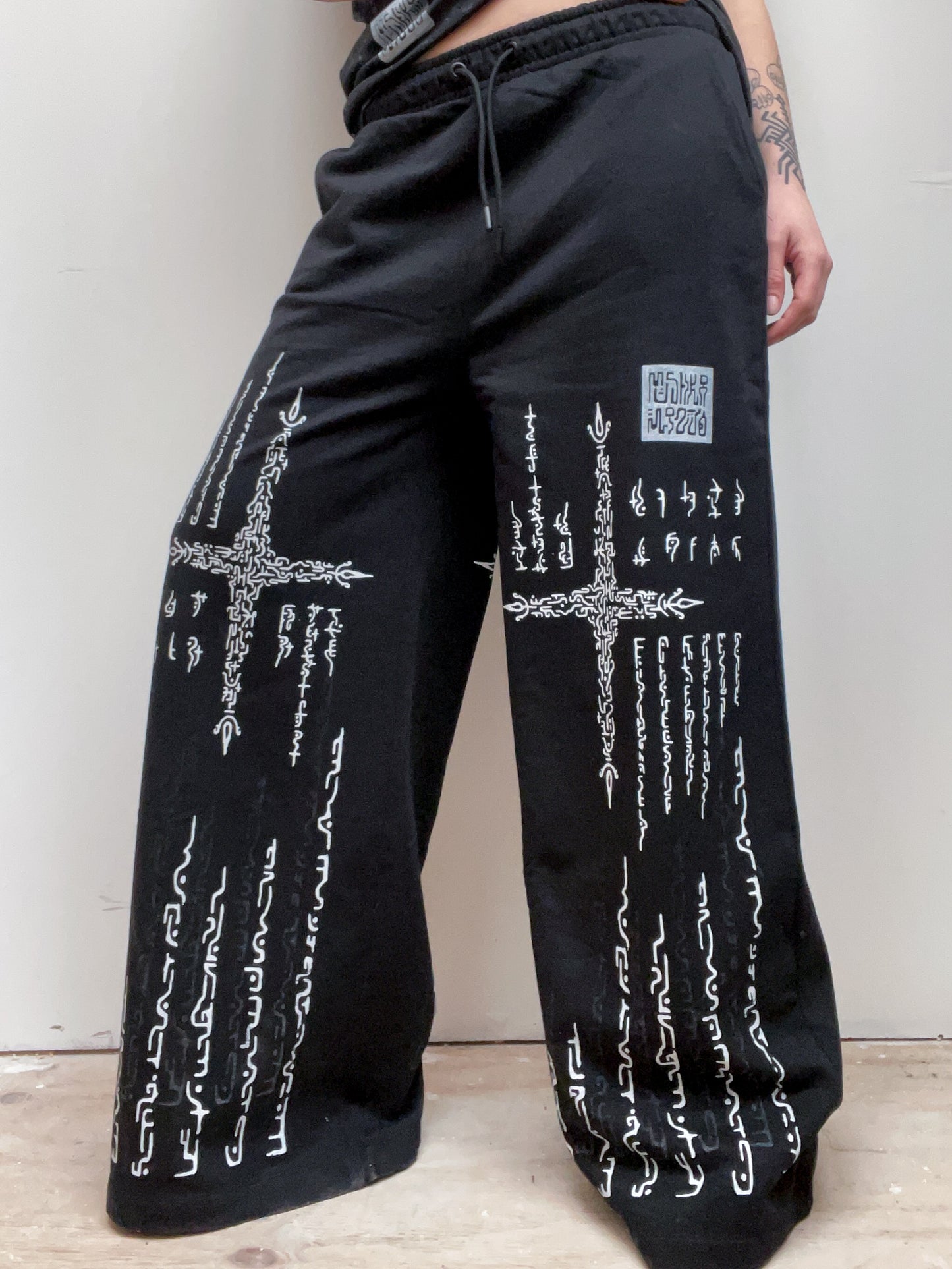 Alien Contact Hand printed wide leg tracksuit bottoms/ joggers. (Gender Neutral. Black)