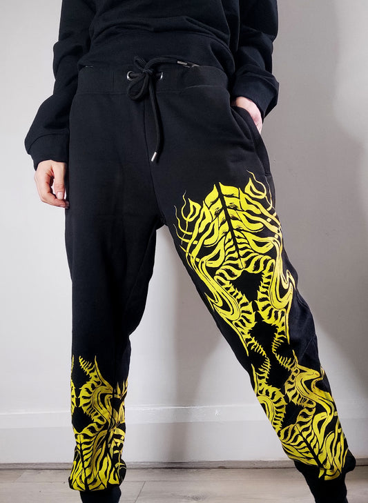 Biomechanika Hand printed gender neutral organic cotton tracksuit bottoms/Joggers. Black and Yellow