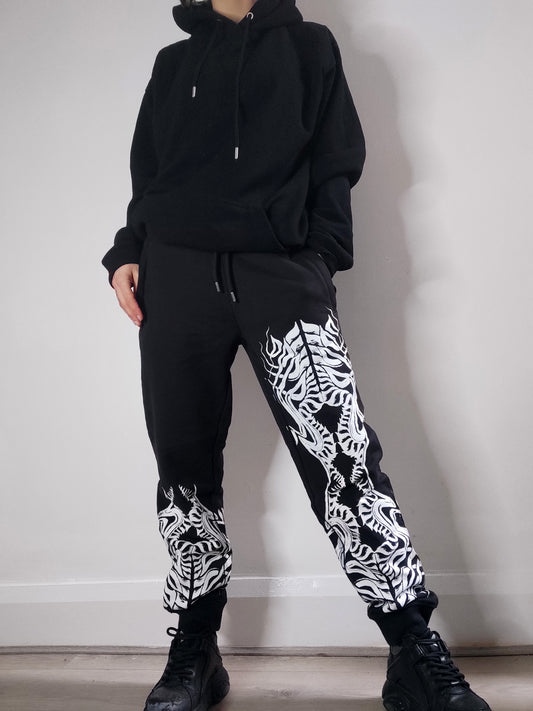 Biomechanika Full hand printed organic cotton gender neutral tracksuit. Black and white