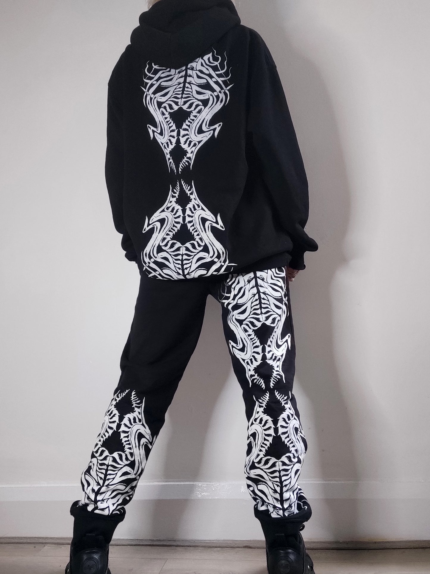 Biomechanika Full hand printed organic cotton gender neutral tracksuit. Black and white