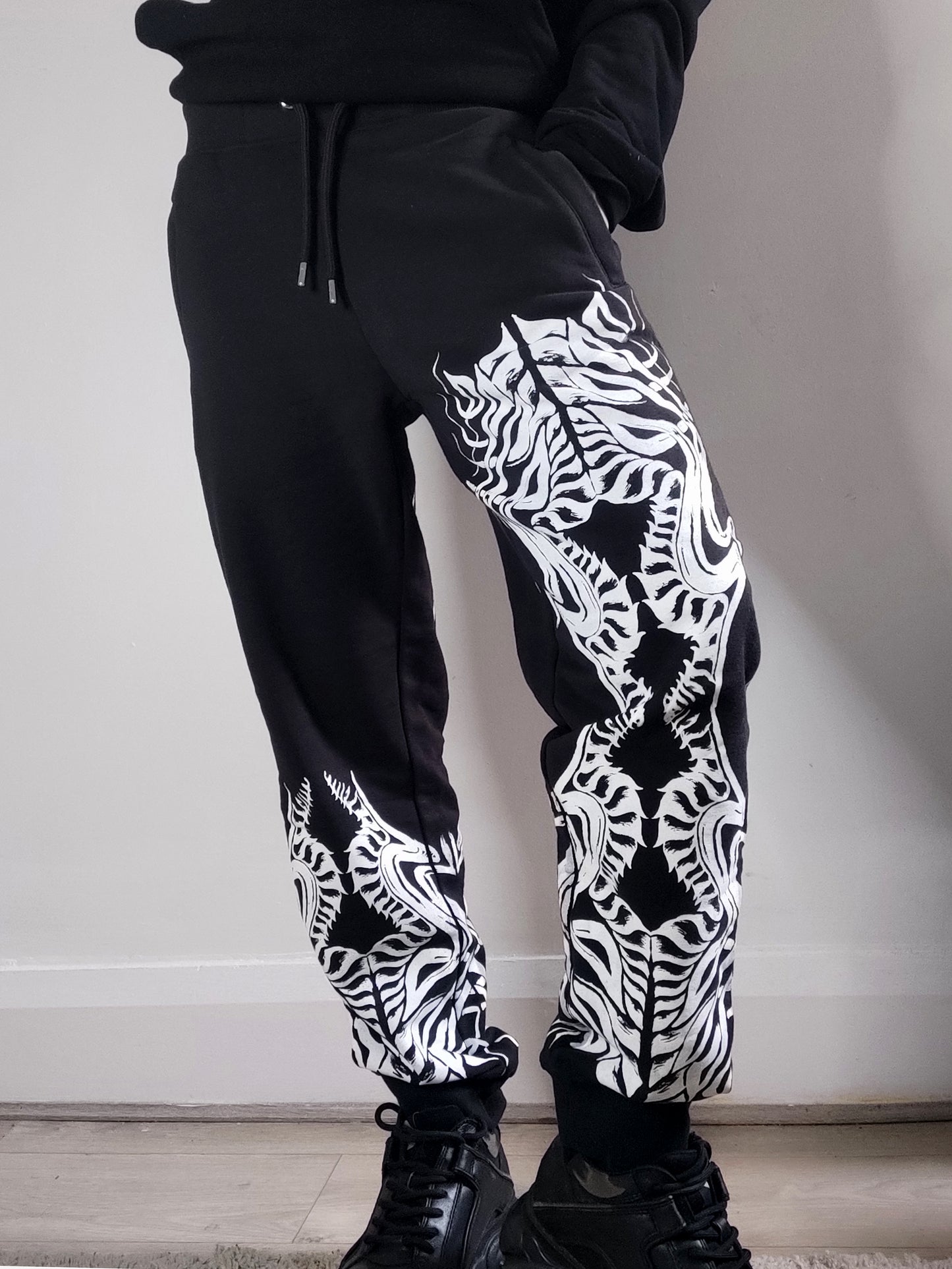 Biomechanika Full hand printed organic cotton gender neutral tracksuit. Black and white