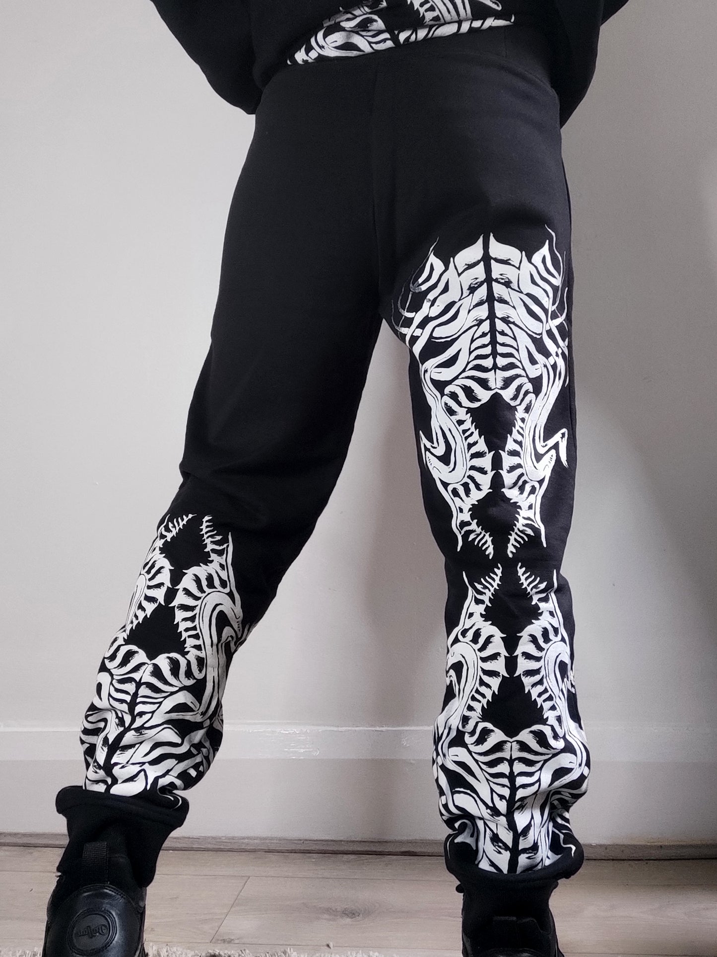 Biomechanika Full hand printed organic cotton gender neutral tracksuit. Black and white